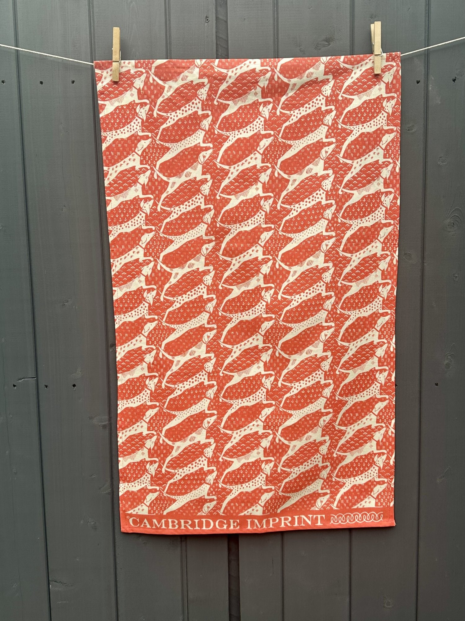 Cambridge Imprint "Dogs Coral", Pure cotton tea towel. Printed in the UK.